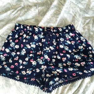 Medium, blue knit shorts with a floral pattern from About a Girl